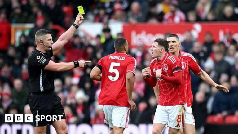 Nottingham Forest: Forest ask for VAR audio after Manchester City defeat Referee Rob Jones books Elliot Anderson, with the official raising his yellow card above head height and pointing towards the animated Nottingham Forest player, in red and white, who has both hands out in front of his chest