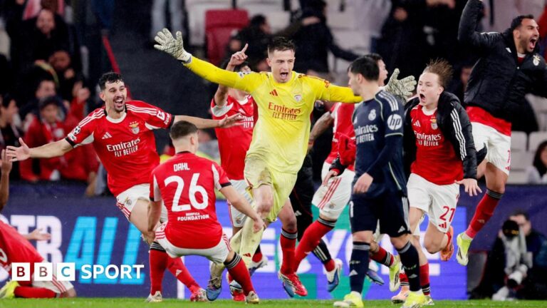How Jose Mourinho’s Benfica stunned Real Madrid to qualify for Champions League play-offs Goalkeeper Anatoliy Trubin celebrates scoring for Benfica against Real Madrid. In a yellow kit he runs among joyous team-mates who are wearing red and white kit