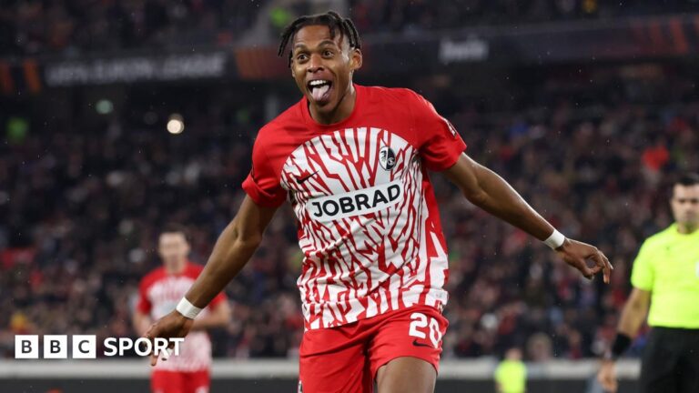 Junior Adamu celebrates after scoring for Freiburg