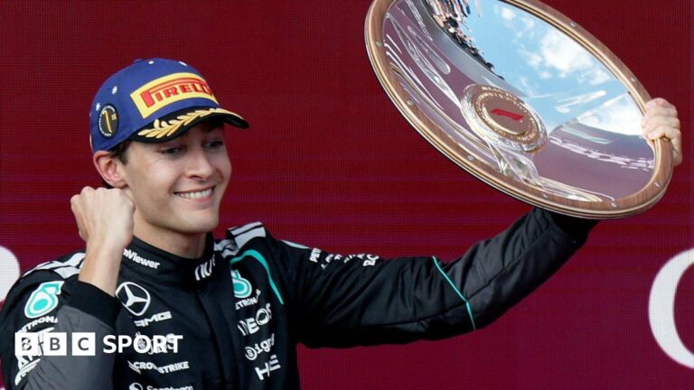 Australian Grand Prix result: George Russell wins from Kimi Antonelli as new era F1 era begins Mercedes' George Russell clenches his fist and lifts up the winner's trophy on the podium after the Australian Grand Prix