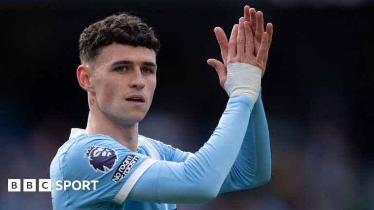 Phil Foden claps
